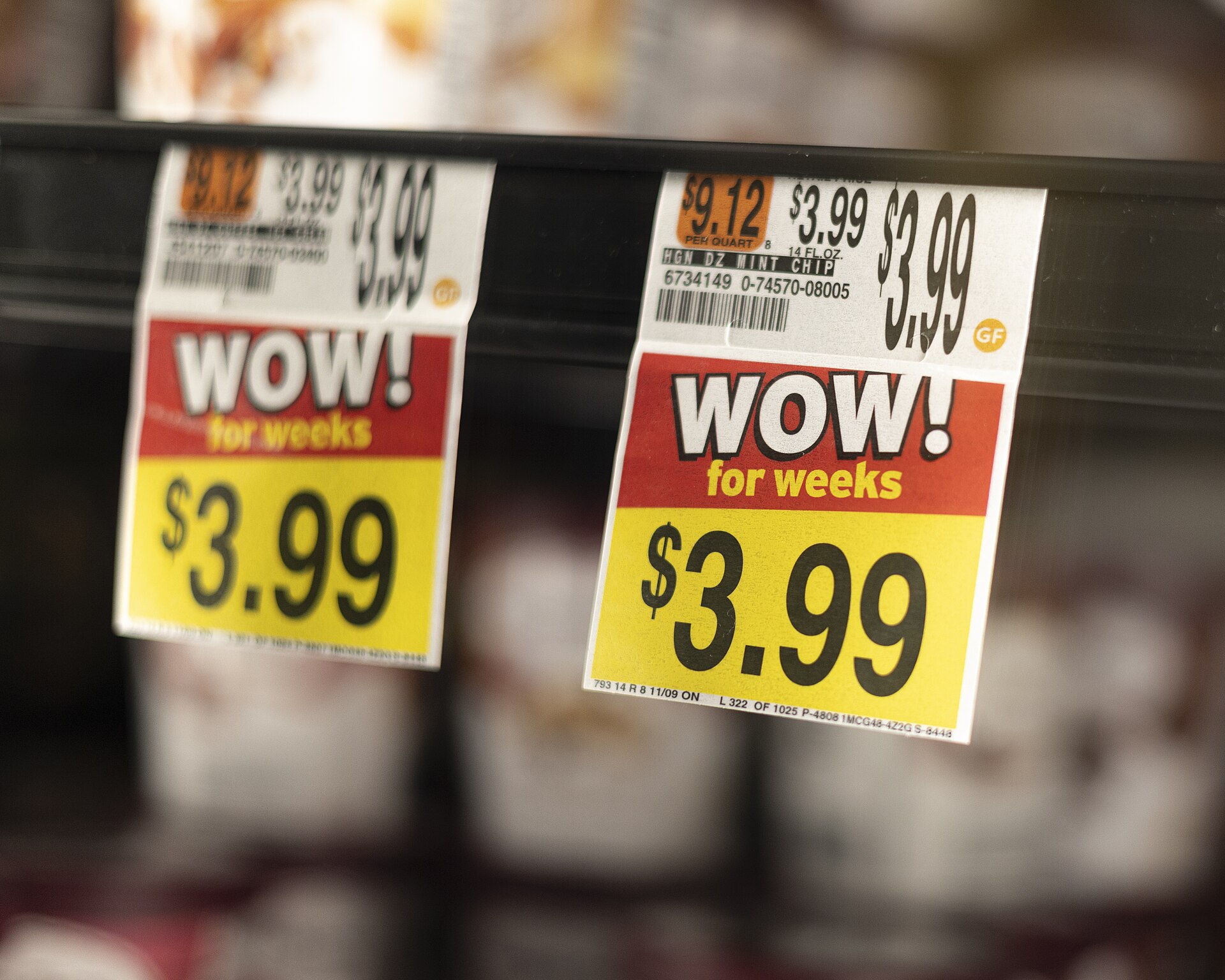 Close-up of bright yellow WOW sale price tags — Wealthy Affiliate pricing explained for 2026