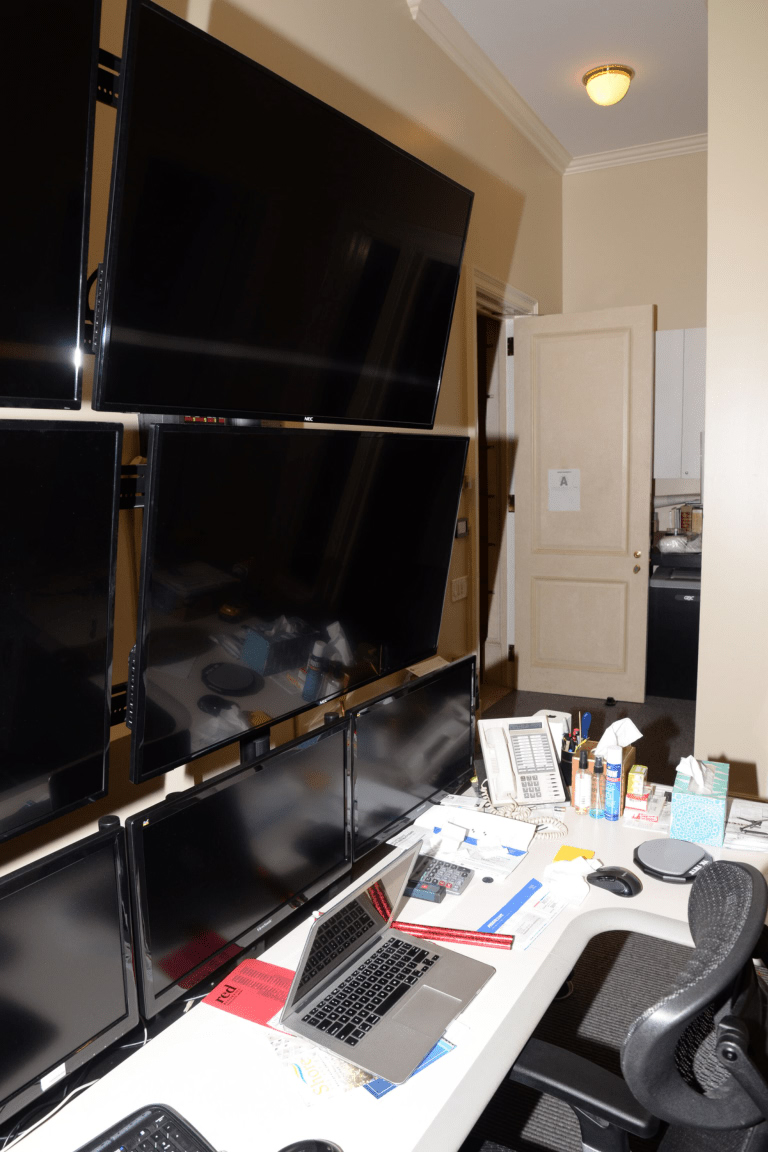 Affiliate marketing starter toolkit: organized home office workspace with laptop and monitors