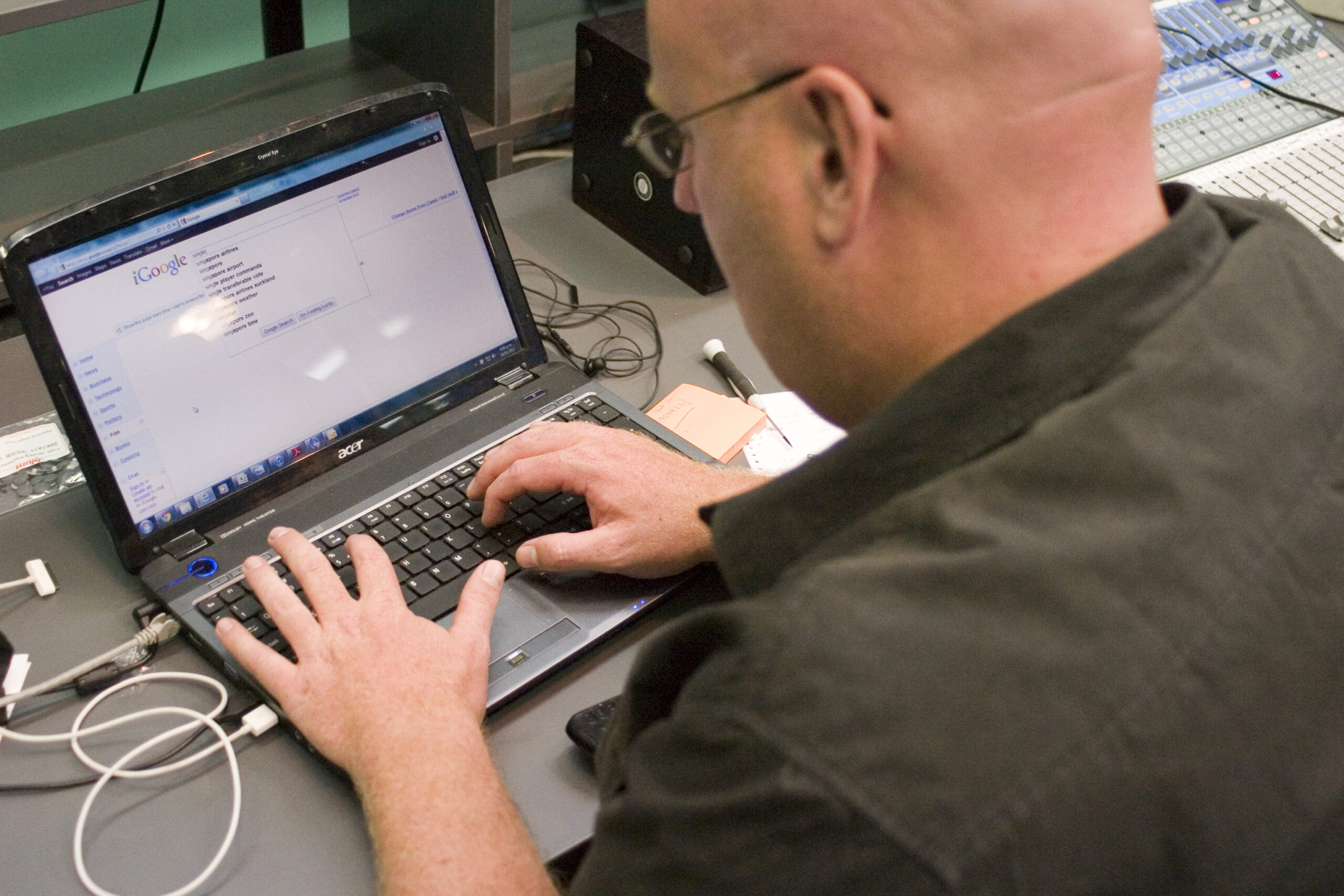 Laptop showing Google search results during keyword research for affiliate articles