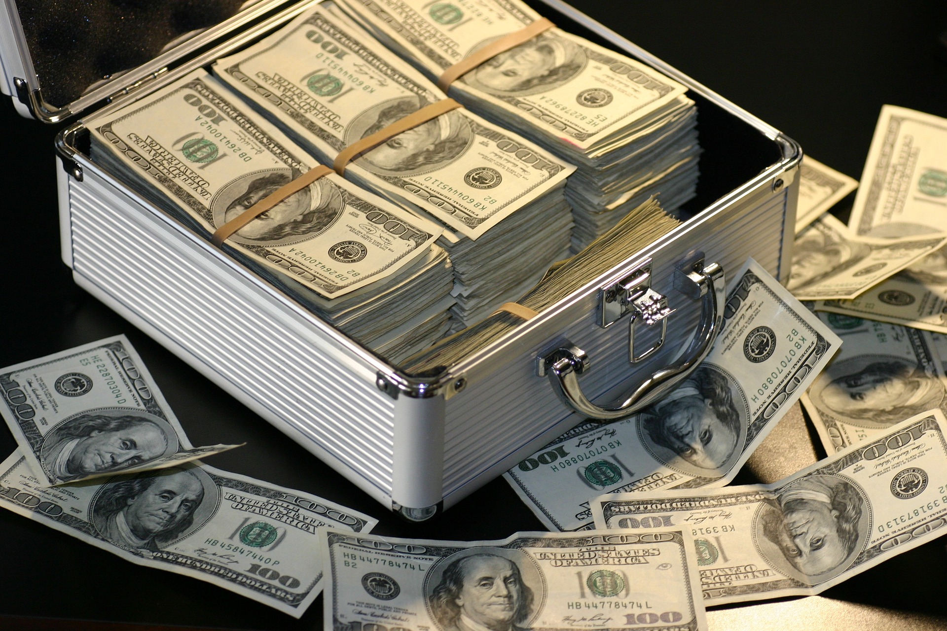 US dollar bills — comparing Wealthy Affiliate pricing to buying hosting, keyword tools, and courses separately
