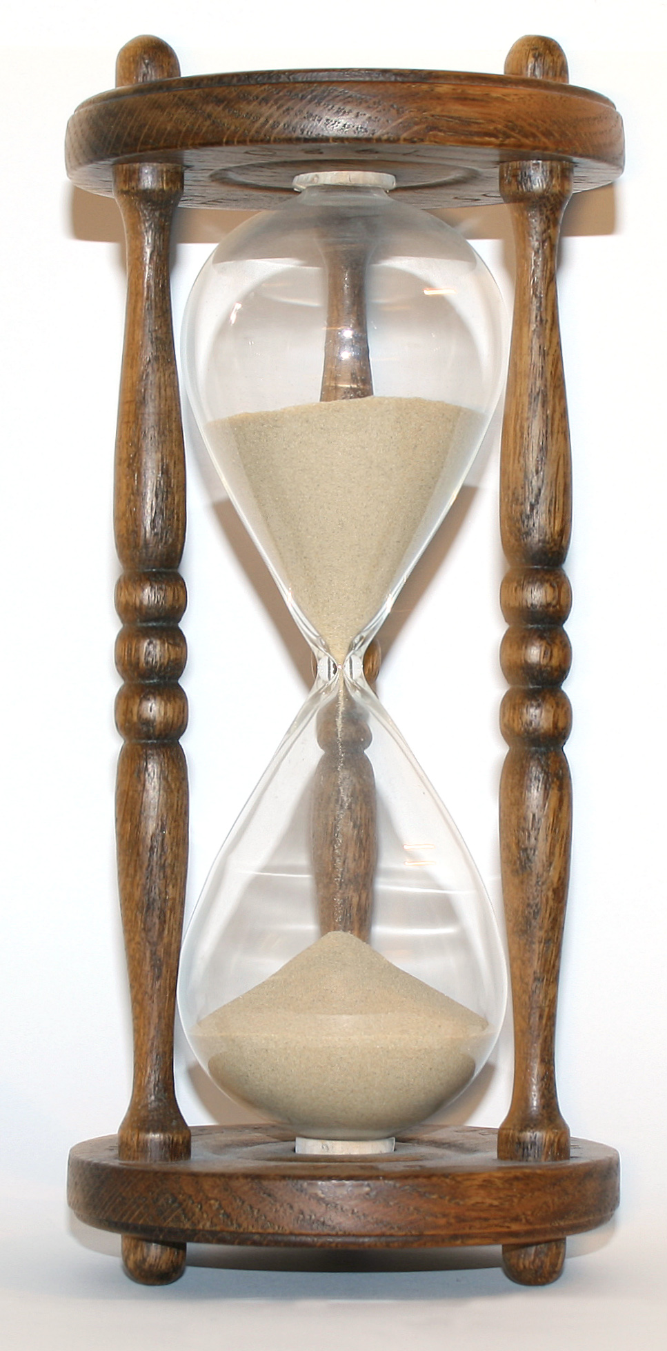 Wooden hourglass representing the realistic timeline to earn with affiliate marketing