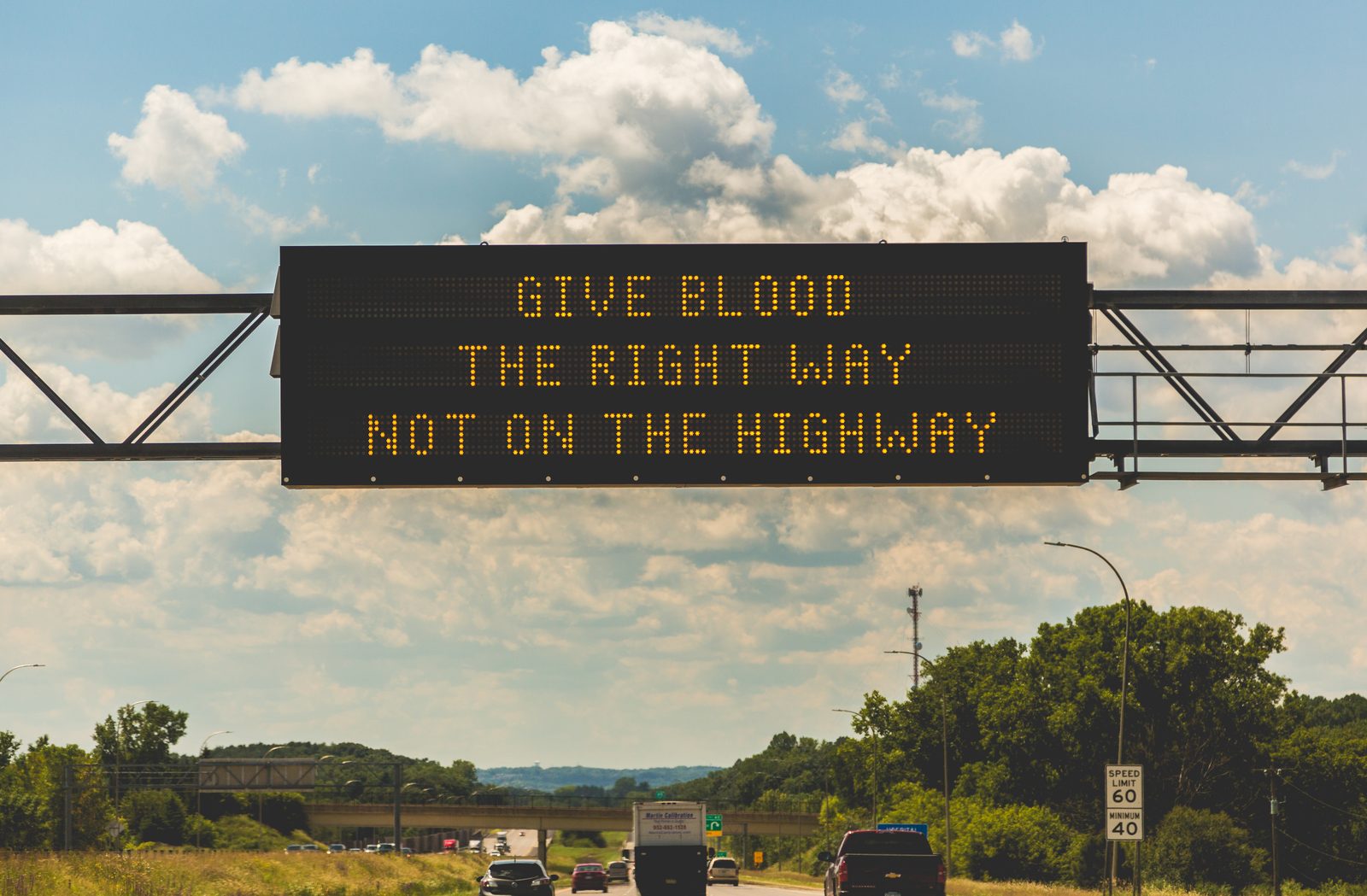 Paid traffic versus free traffic: a digital highway billboard representing rented advertising attention