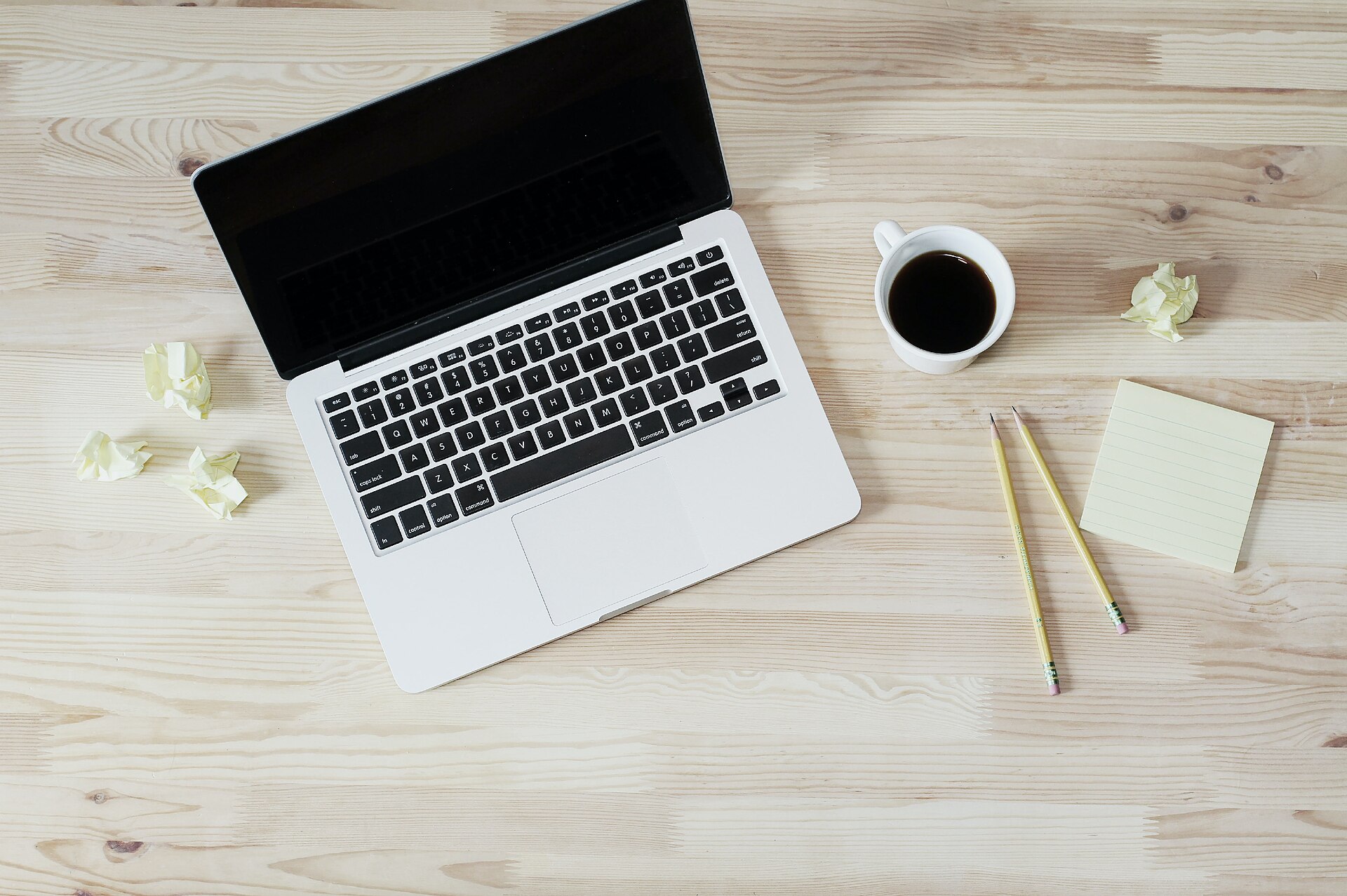 Beginner affiliate marketer working on laptop