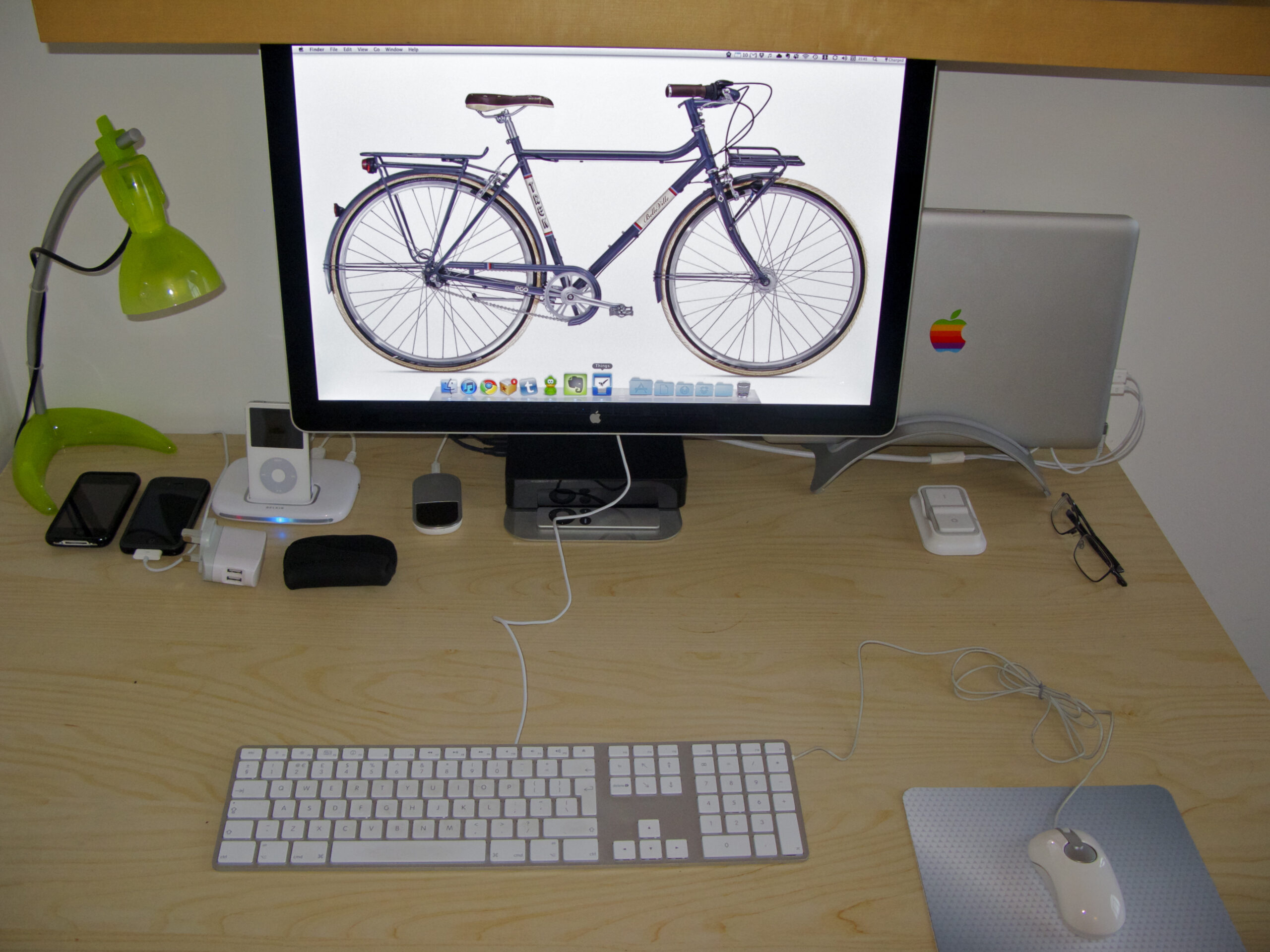 Researching Wealthy Affiliate at a desk before deciding to join