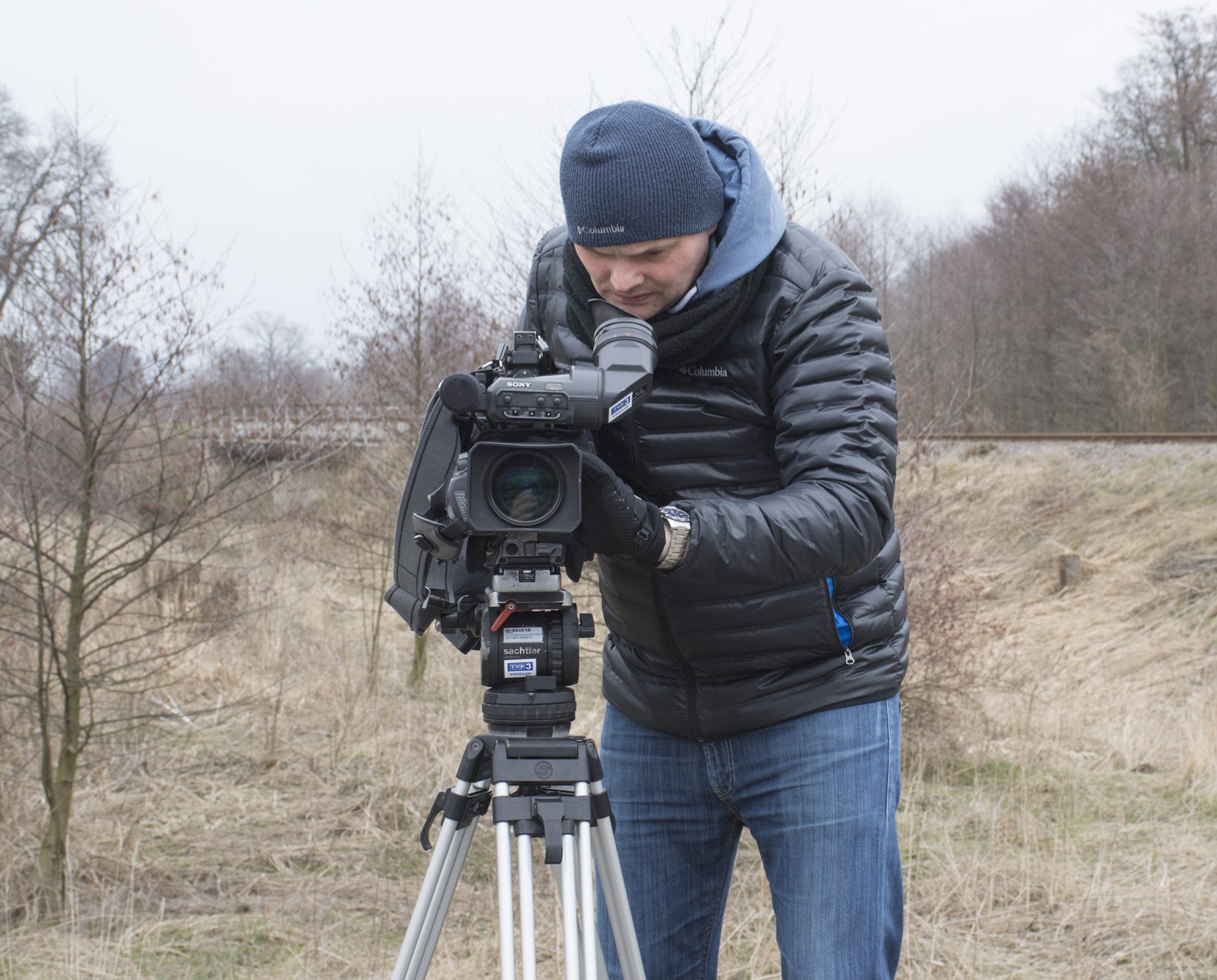 Camera operator at work filming content
