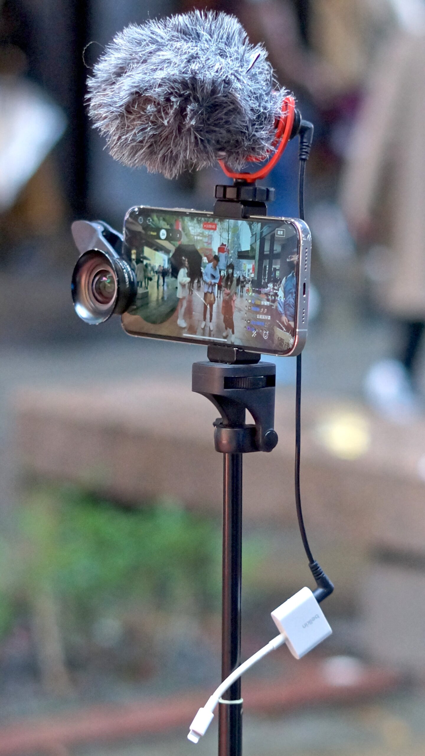 Person recording video with a smartphone