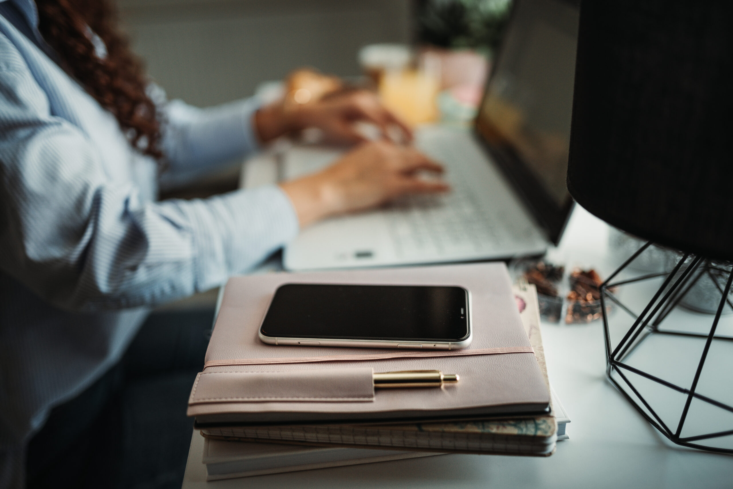 Person studying affiliate marketing course material on a laptop at a desk